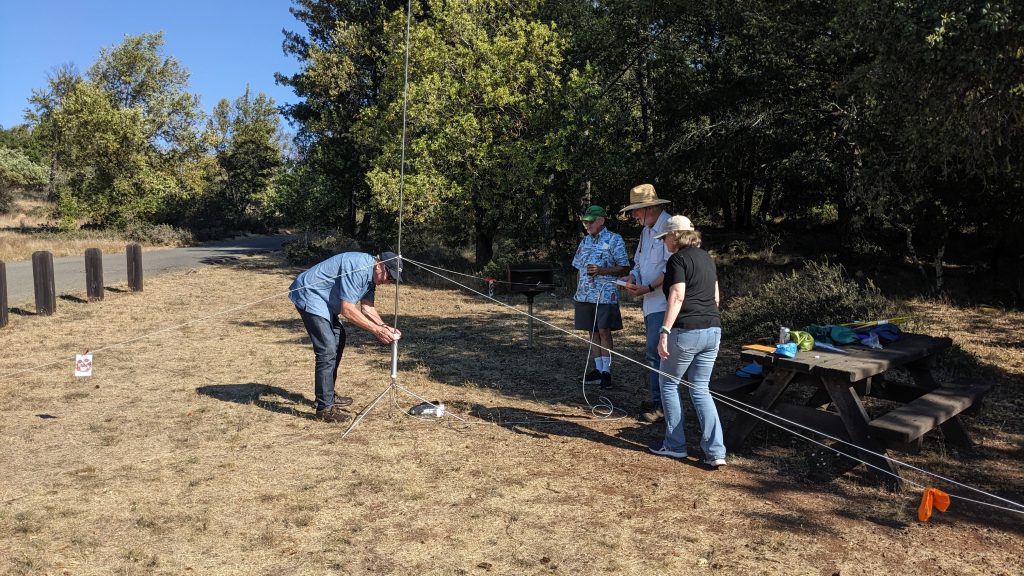 Members setting up an antenna.